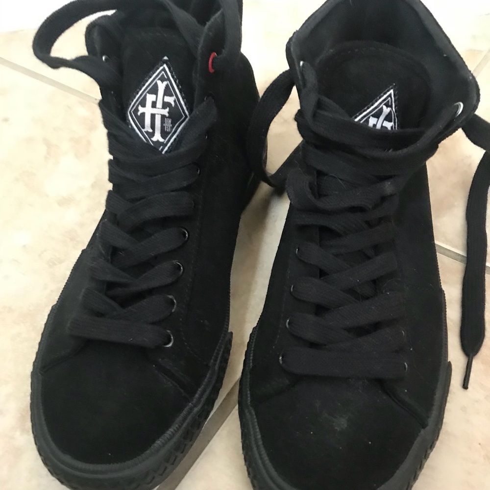 Black hightop sneakers from Hot Topic
